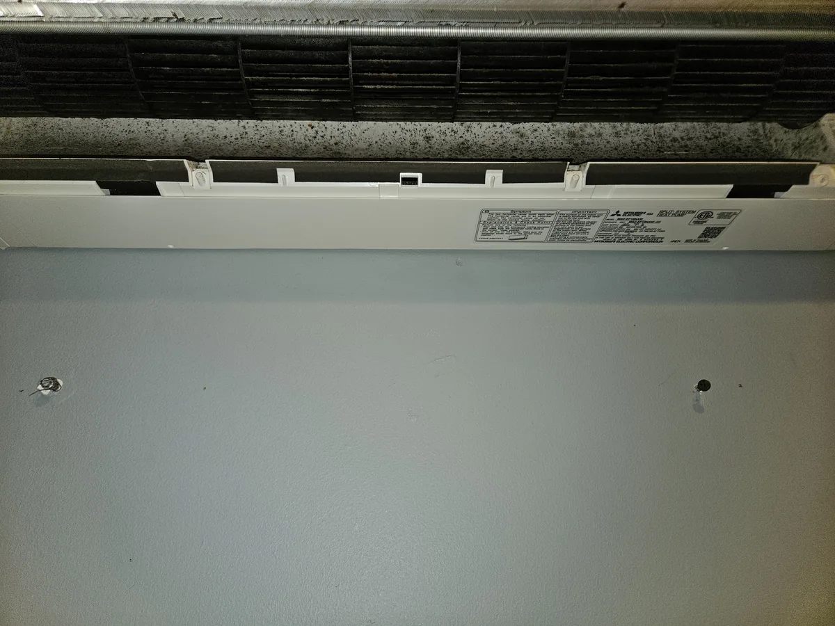 Blackened blower wheel and mold on a Mitsubishi MSZ-EF15NAW in Bedford, MA