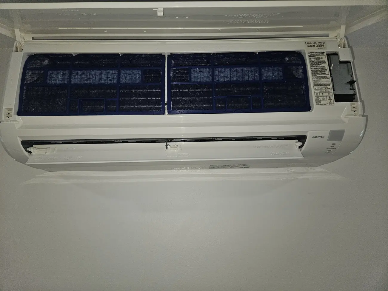 Clean filters back in a Mitsubishi mini-split in Brighton, MA after deep cleaning