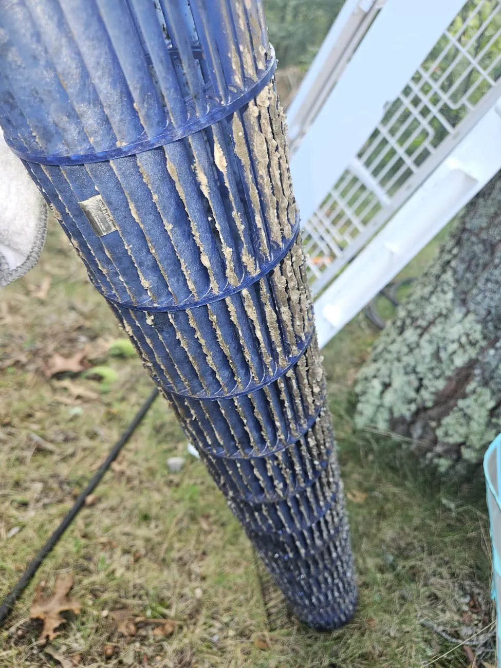 Blower wheel packed solid with buildup, removed from an MRCOOL mini-split in Falmouth, MA