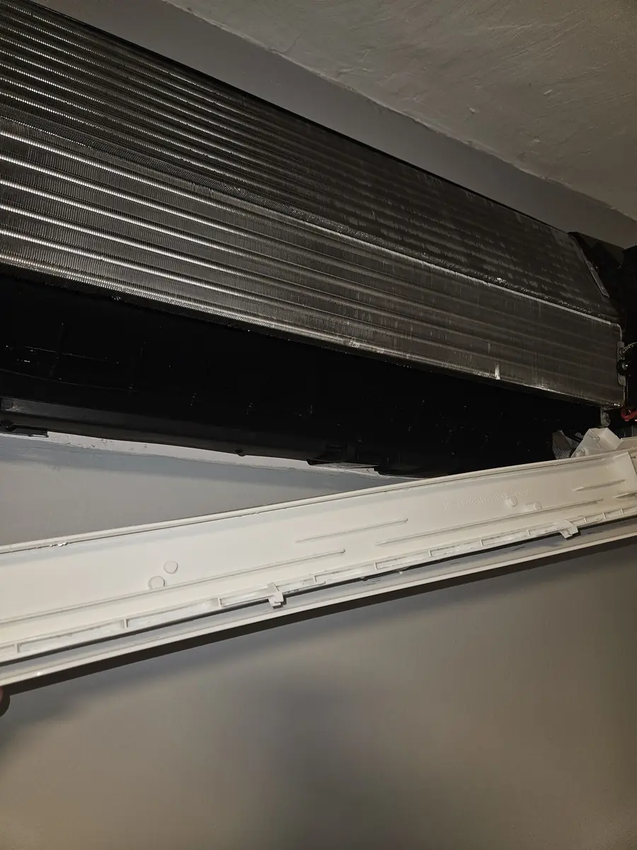 LG mini-split head opened on the wall of a Franklin MA home before cleaning