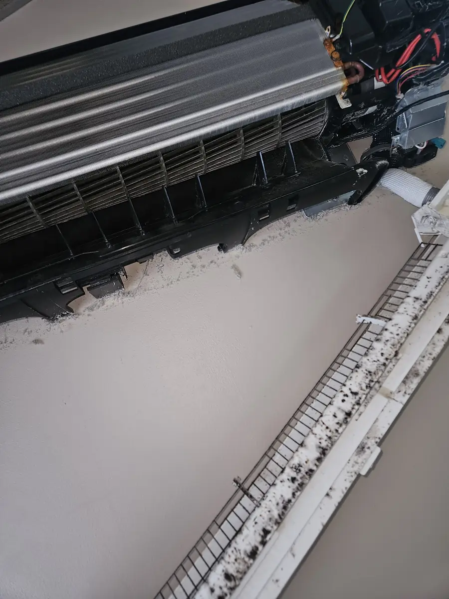 Mini-split stripped down mid-cleaning in Franklin MA with the moldy filter removed