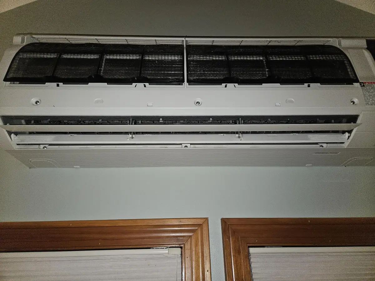 Daikin mini-split in Londonderry, NH with filters darkened before cleaning