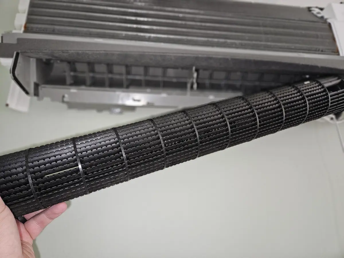Blackened blower wheel removed from a Daikin mini-split in Pepperell, MA