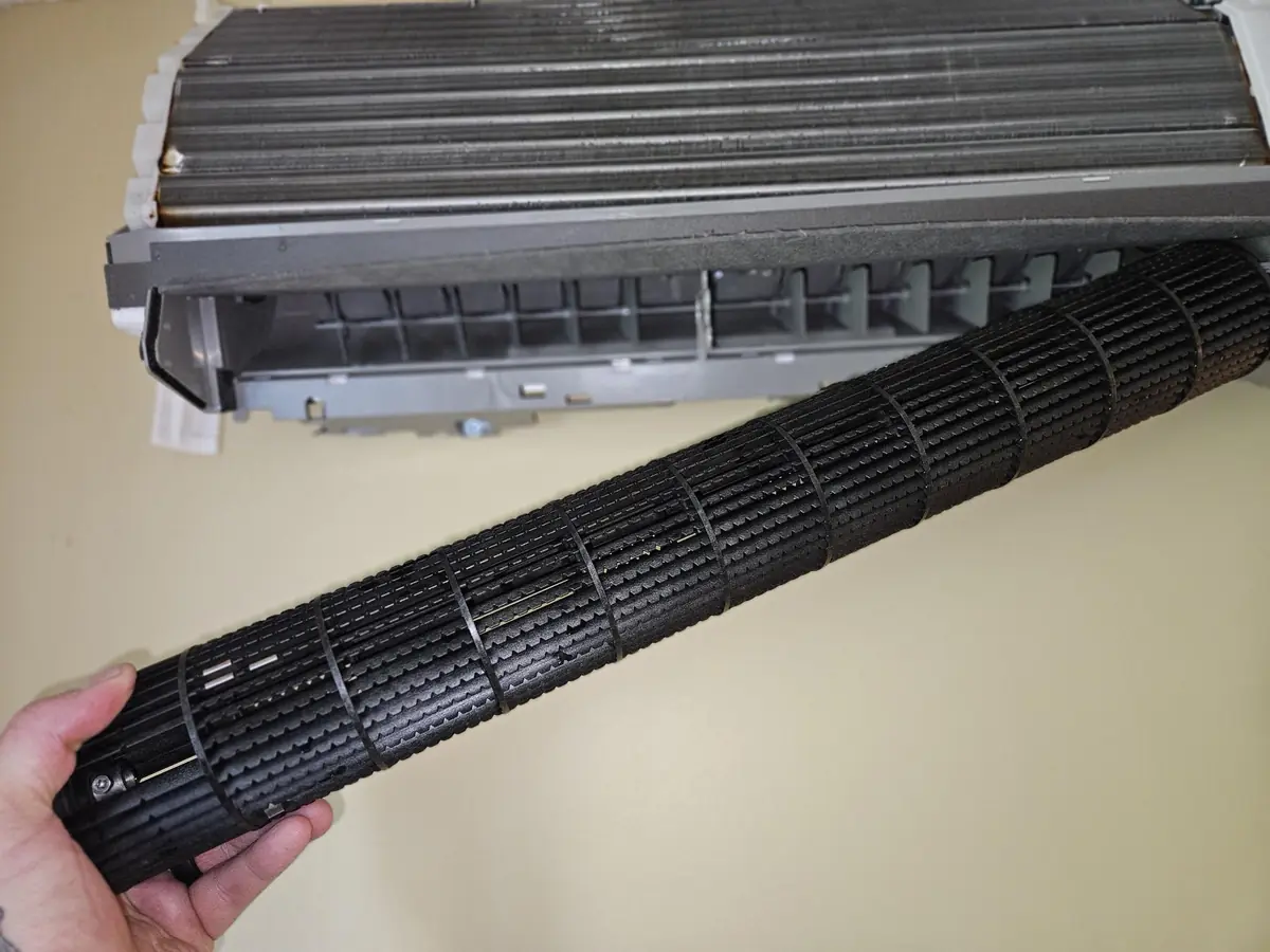 Third blackened blower wheel from the same Pepperell MA multi-zone system