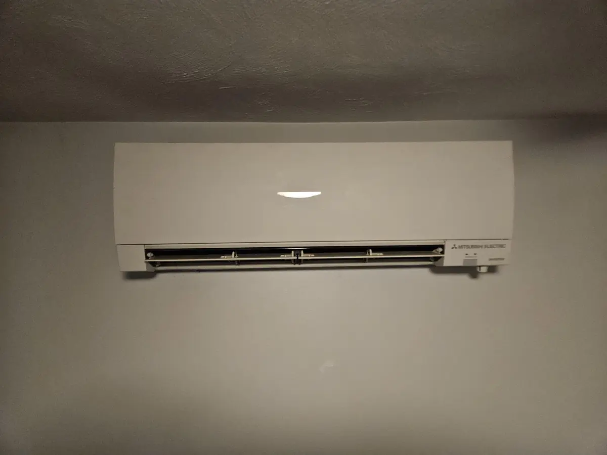 Mitsubishi wall unit clean and back together in a Raymond, NH home